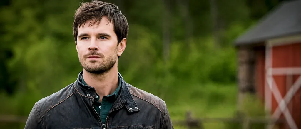 Ty Borden standing on the ranch in Heartland Season 13