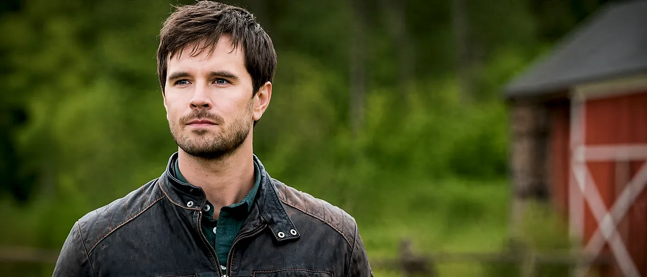 Ty Borden standing on the ranch in Heartland Season 13